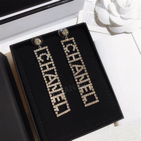 chanel black logo earrings|chanel letter logo drop earrings.